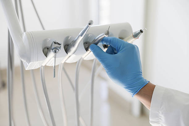 Professional Tooth Extraction technician working in Shavano Park, TX